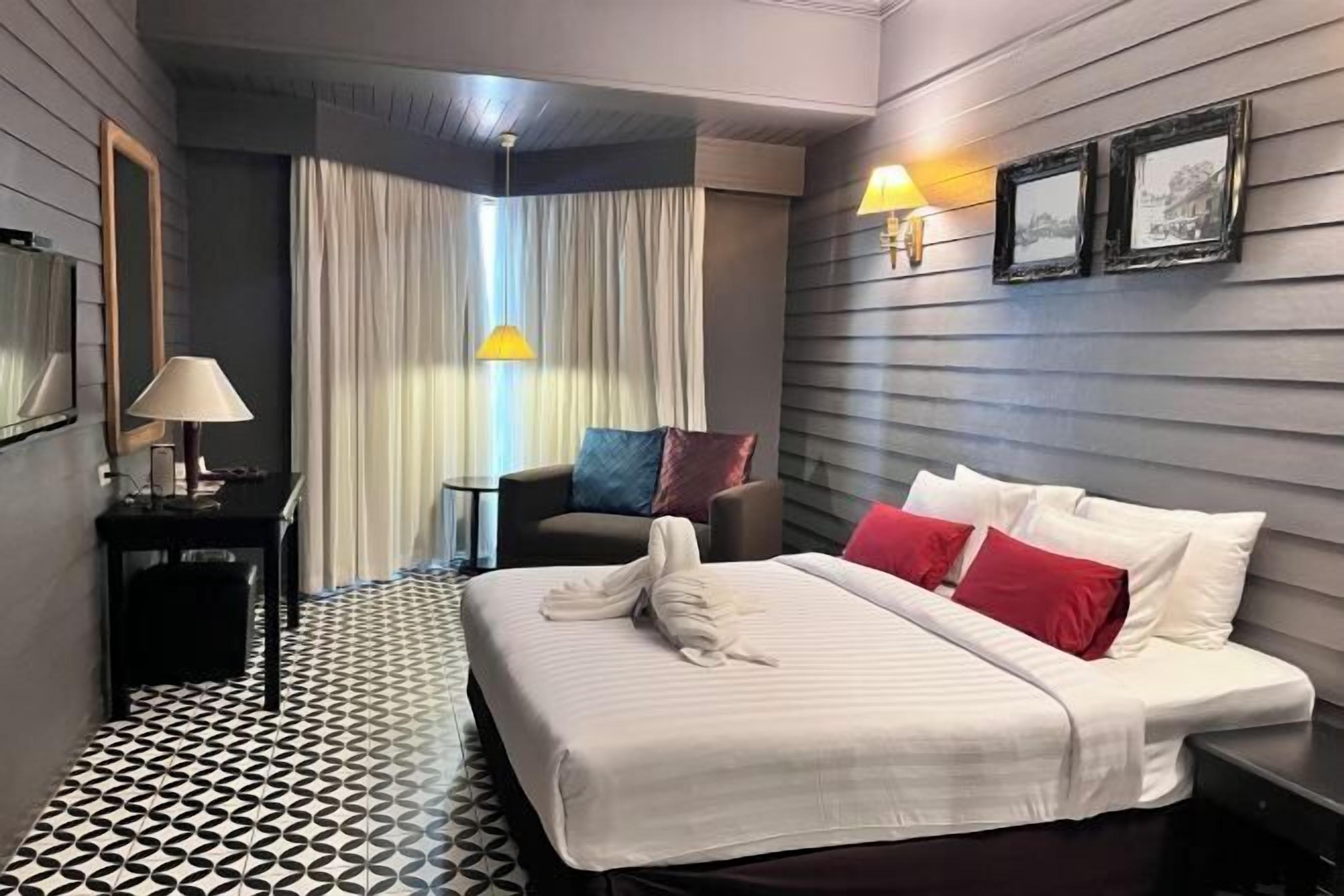 Desk, laptop workspace, blackout curtains, free WiFi