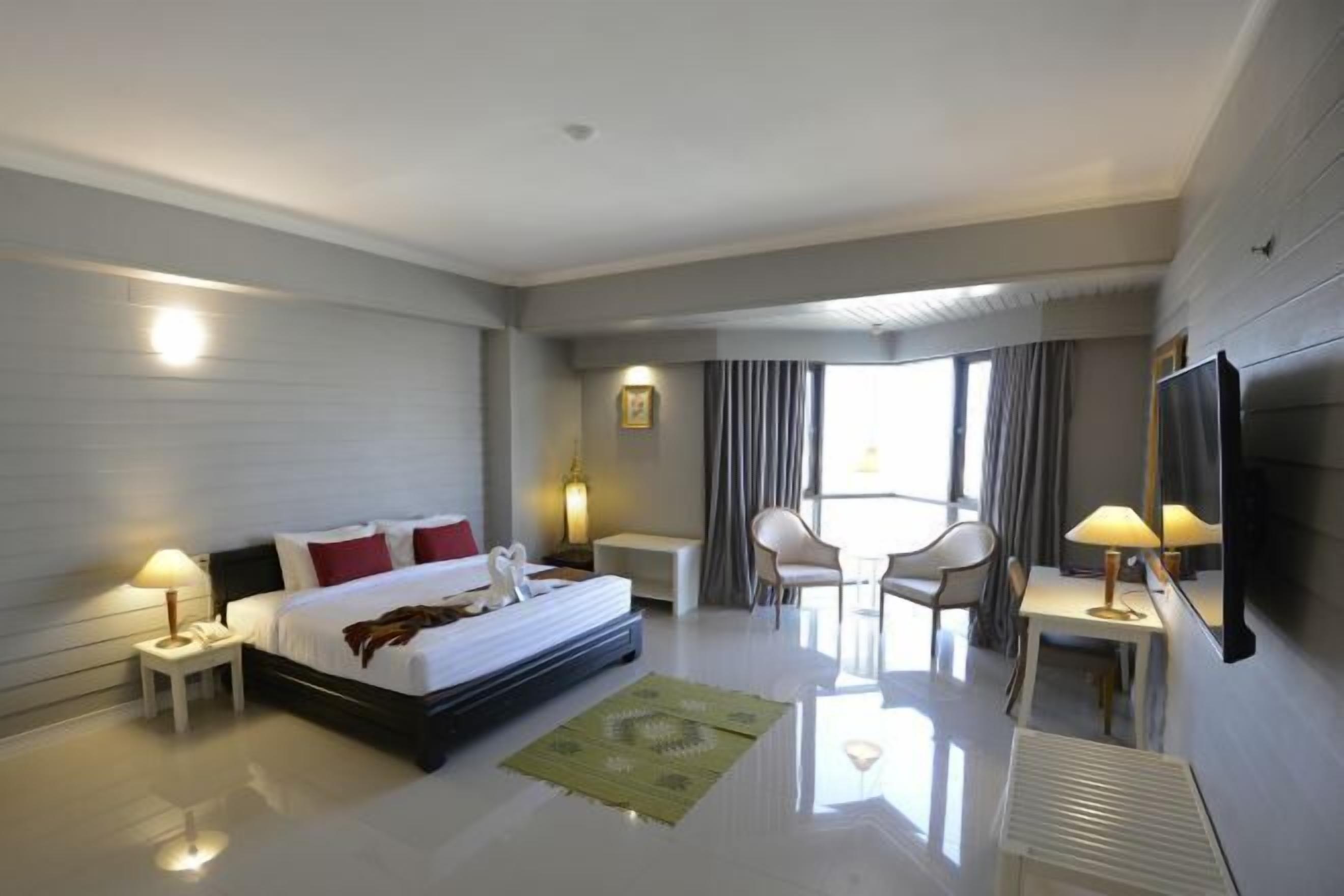 Desk, laptop workspace, blackout curtains, free WiFi