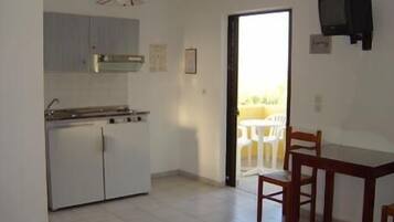 Apartment, 1 Bedroom | Private kitchenette | Fridge, stovetop, coffee/tea maker, electric kettle