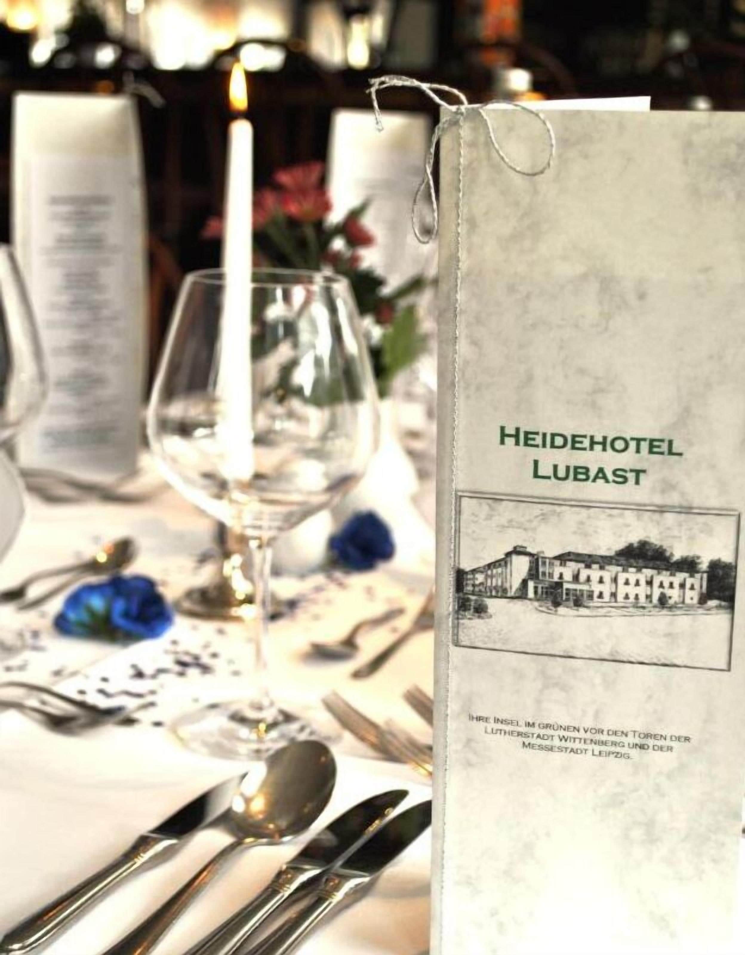 A menu for Heidehotel Lubast with a picture of the hotel.