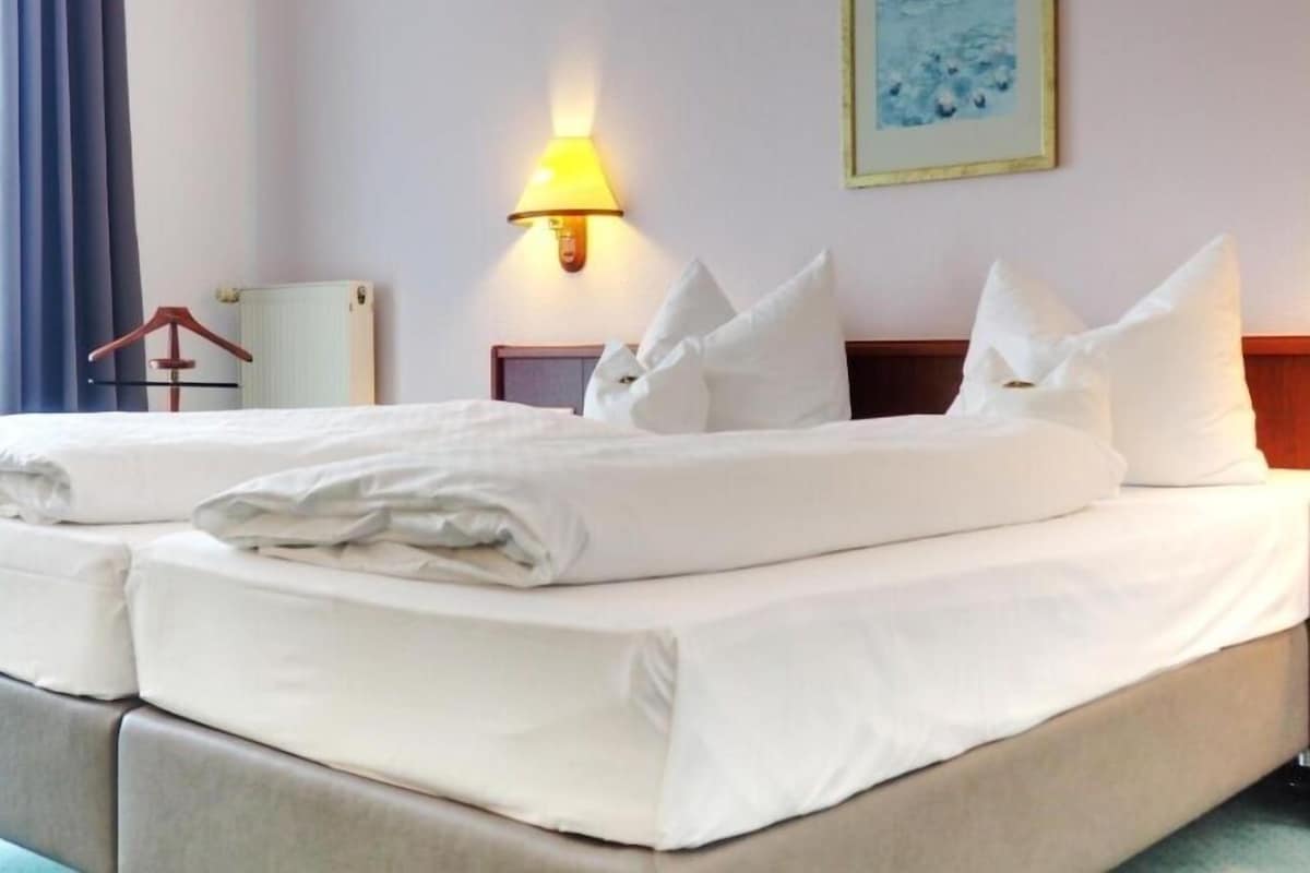 Desk, iron/ironing board (on request), WiFi (free), bed sheets