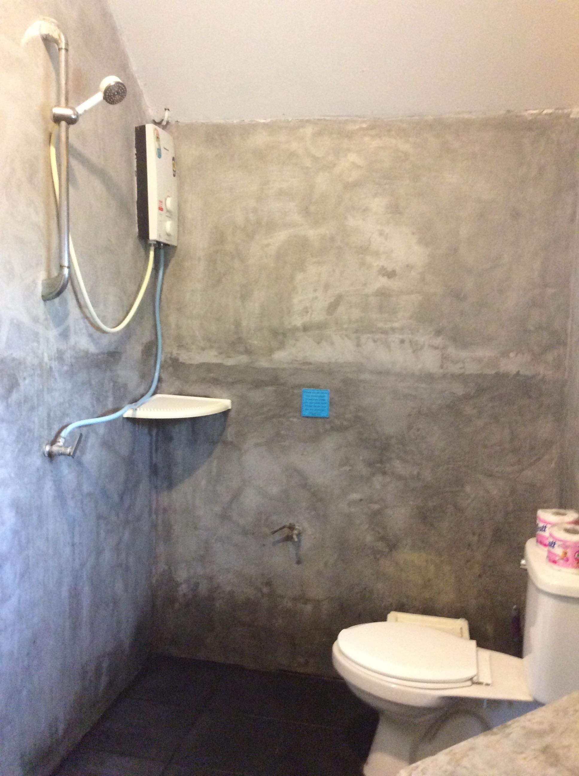 basic bungalow, 1 double bed | bathroom | shower, hair dryer, towels