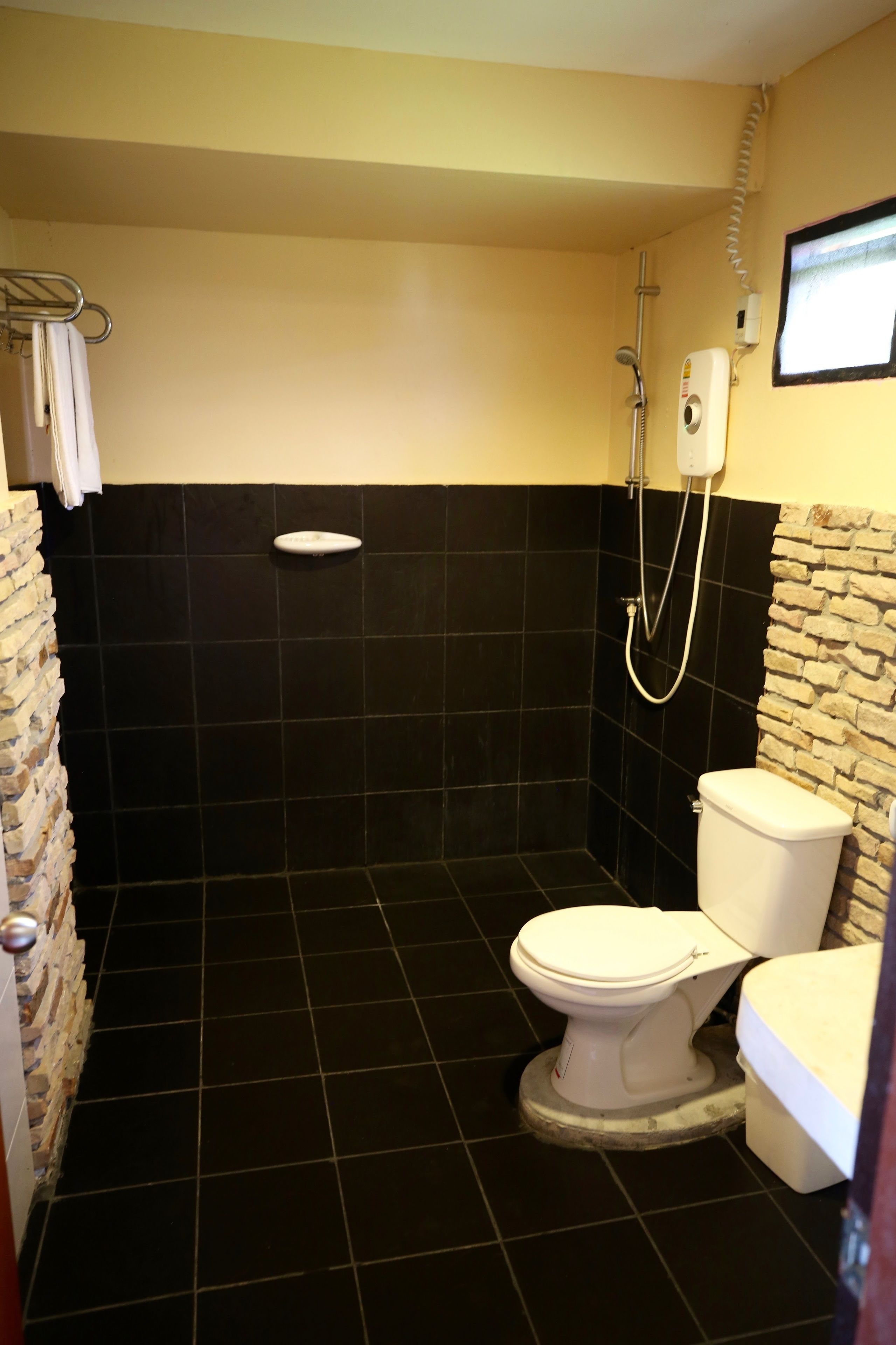 priviledge bungalow with partial seaview | bathroom shower