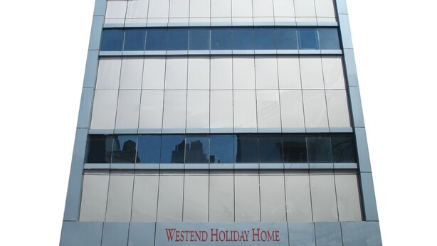 A building with a sign reading "Westend Holiday Home". - Westend Holiday Home (New Delhi)