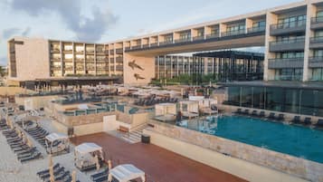 4 outdoor pools, open 8:00 AM to 7:00 PM, cabanas (surcharge)