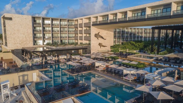 3 outdoor pools, cabanas (surcharge), pool umbrellas