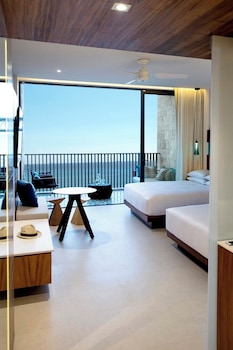 Premium Room, 2 Queen Beds (Ocean Front) | Beach/ocean view at Devossion By Live Aqua Playa del Carmen All Inclusive - Adults Only