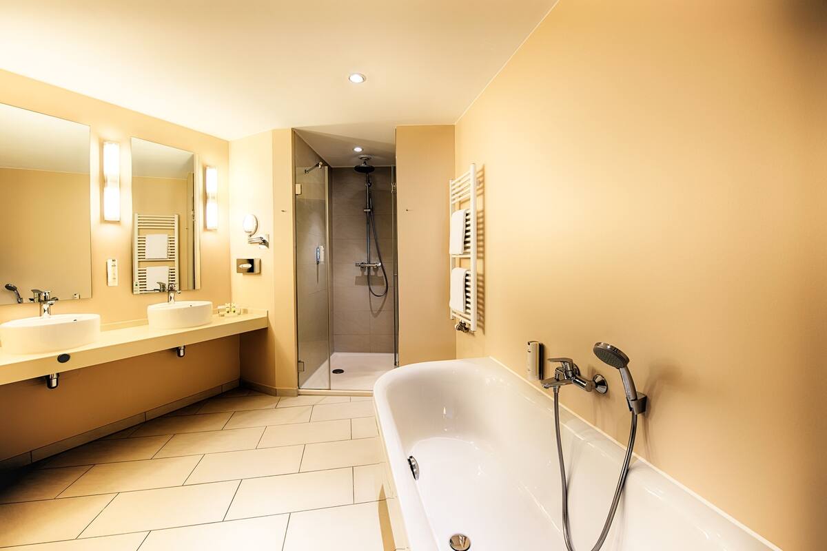 junior suite | bathroom | eco-friendly toiletries, hair dryer, towels