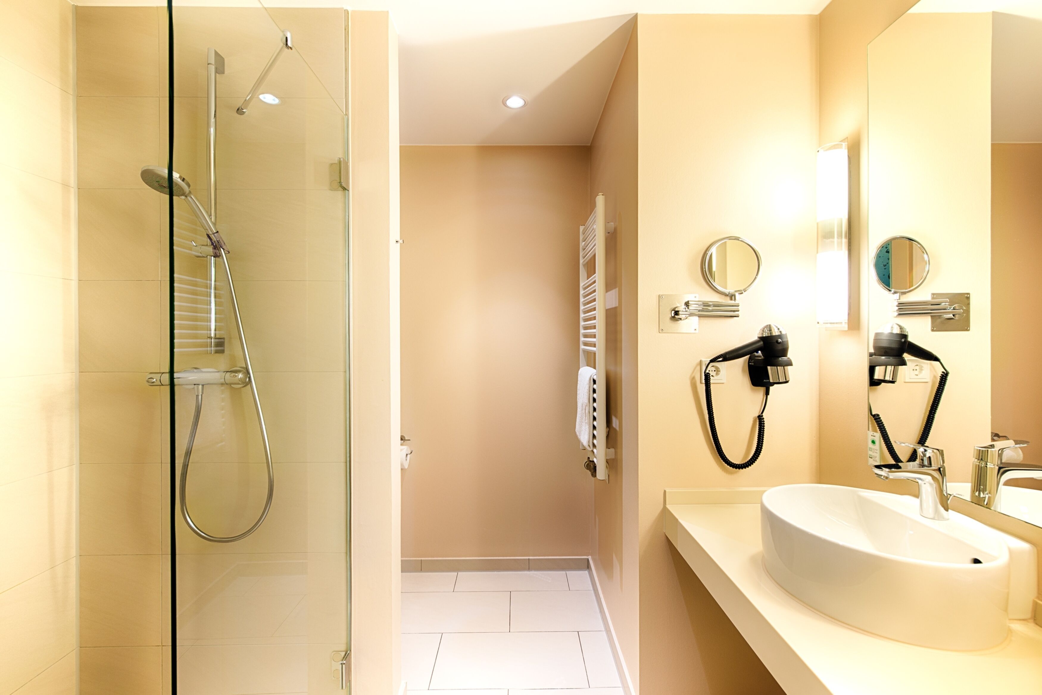 eco-friendly toiletries, hair dryer, towels