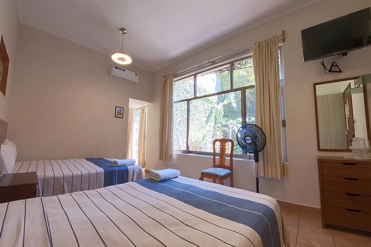 Comfort Room, 2 Double Beds | In-room safe, WiFi (free), bed sheets