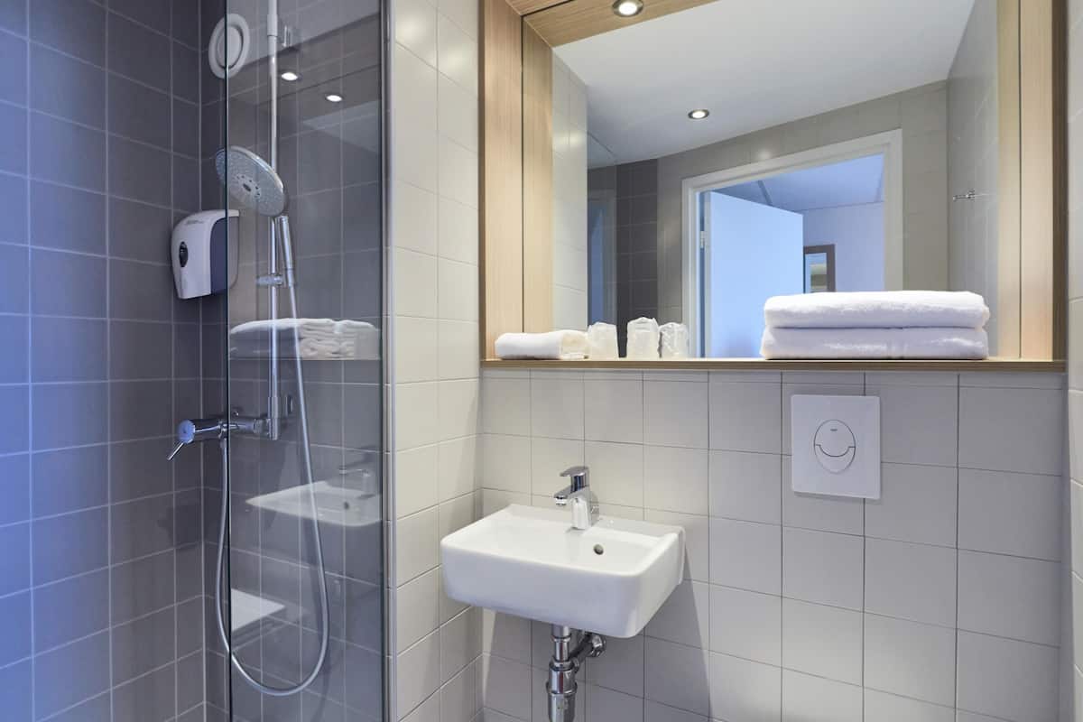 shower, eco-friendly toiletries, towels