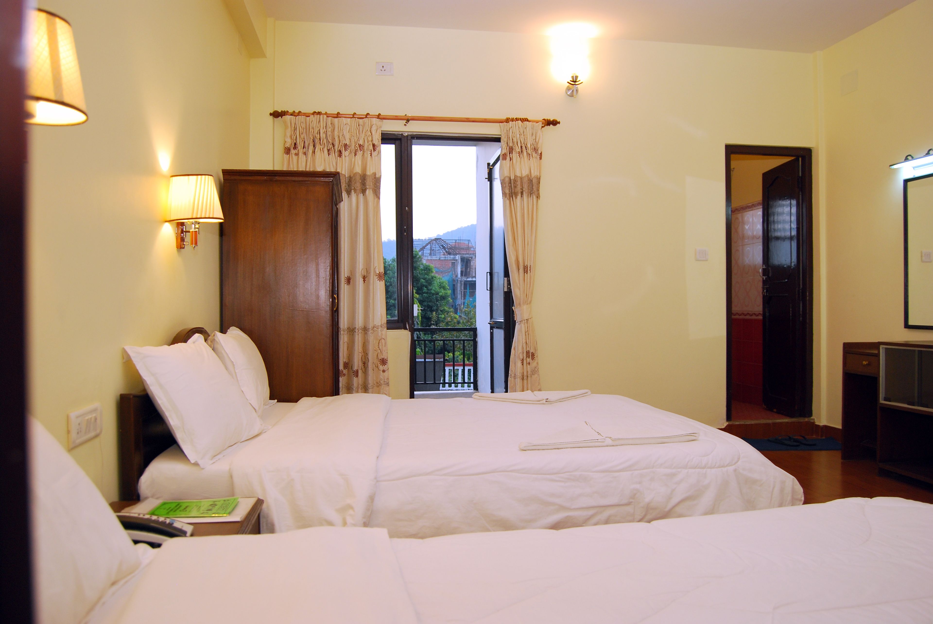 deluxe double or twin room (with fan) | in-room safe, desk, soundproofing, free wifi