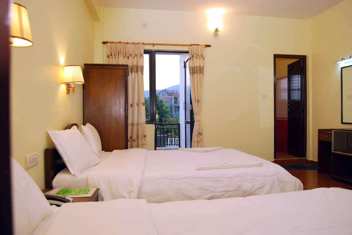deluxe double or twin room (with fan) | in-room safe, desk, soundproofing, free wifi