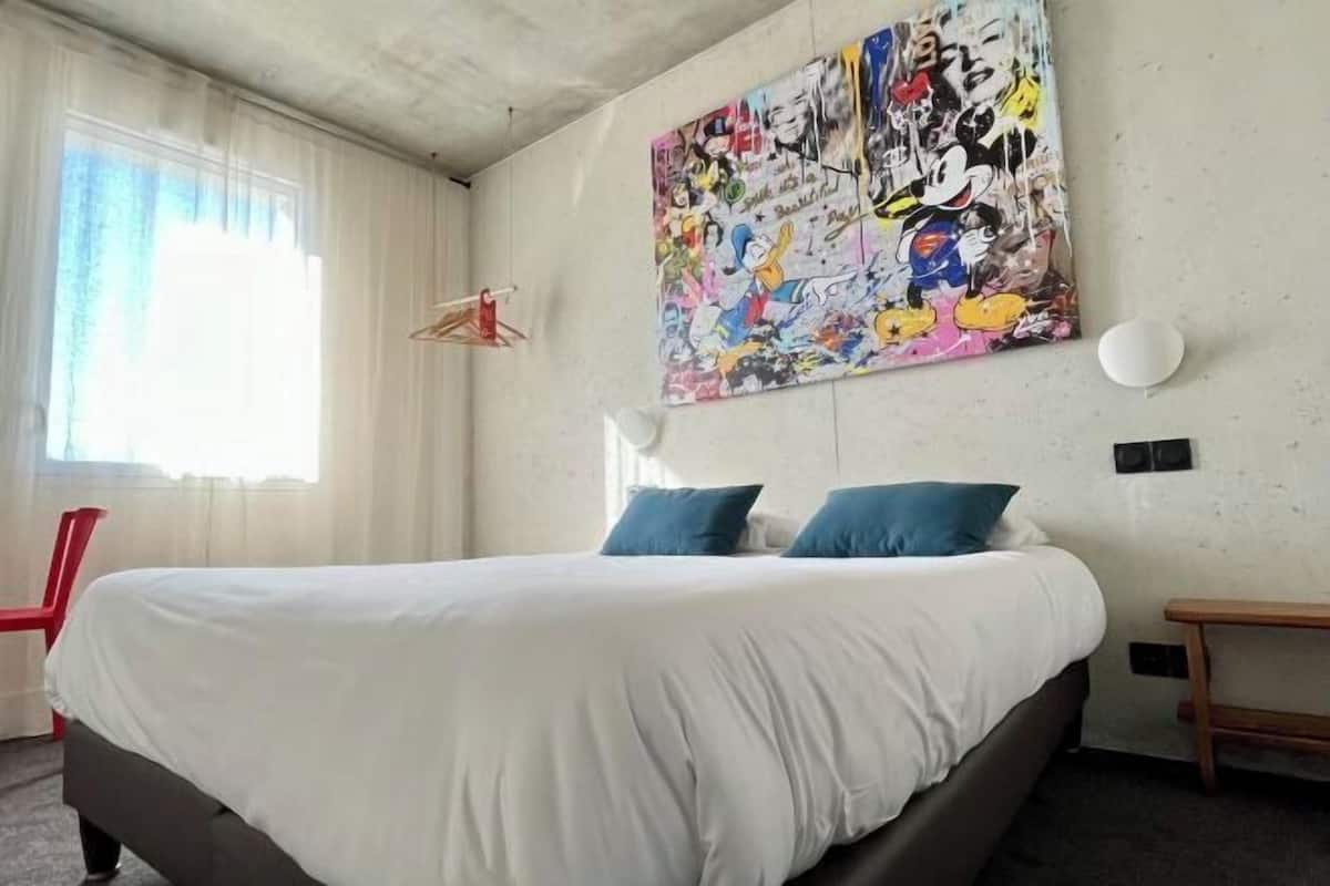 Premium bedding, desk, laptop workspace, blackout curtains