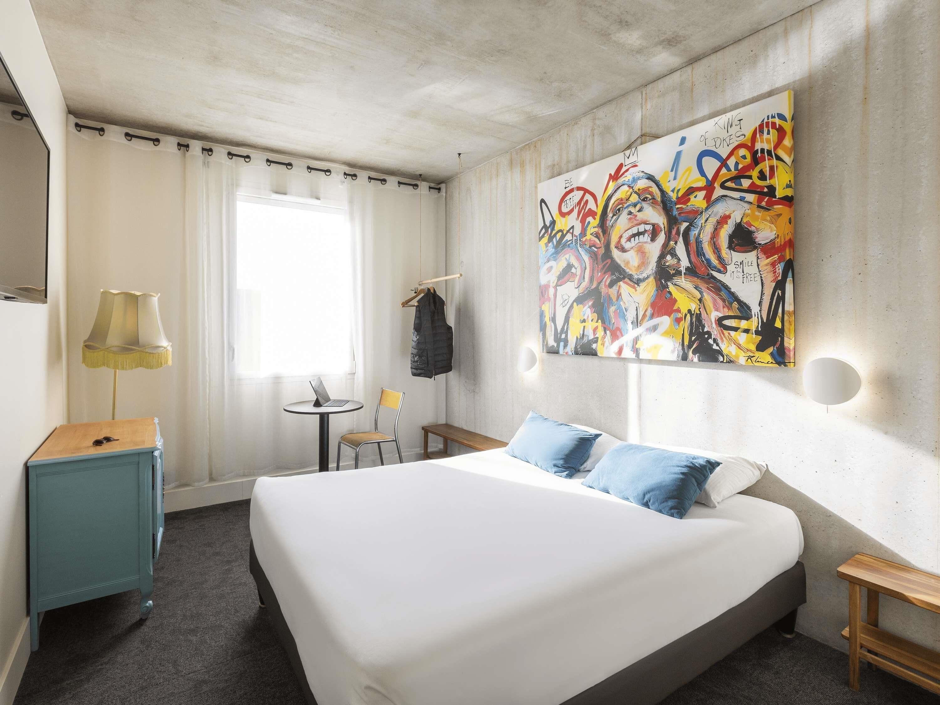 Premium bedding, desk, laptop workspace, blackout curtains