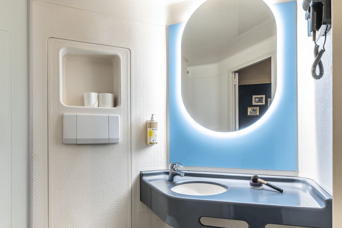 shower, eco-friendly toiletries, hair dryer, towels