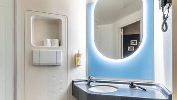 Shower, eco-friendly toiletries, hair dryer, towels