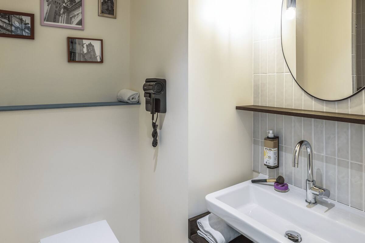 shower, eco-friendly toiletries, hair dryer, towels