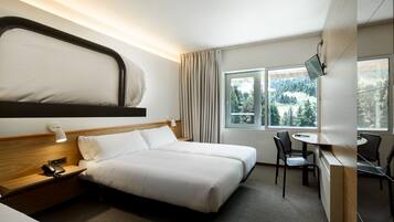 Standaard kamer | Een kluis op de kamer, een bureau, gratis wifi, beddengoed