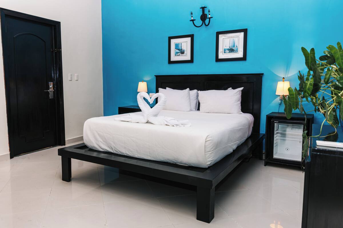 Premium bedding, down comforters, pillowtop beds, in-room safe