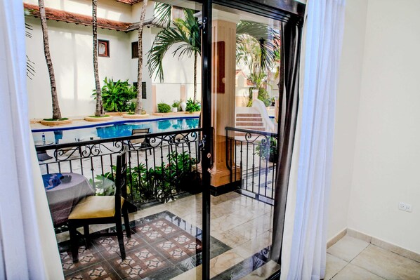 Suite Deluxe con Cama King y Queen | Balcony