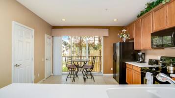 Condo, 3 Bedrooms, 2 Bathrooms | Private kitchen | Full-sized fridge, microwave, oven, stovetop