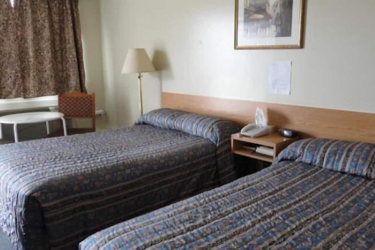Room, 2 Queen Beds | Free WiFi, bed sheets