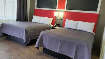 Quarto solteiro standard, 2 camas Queen | Escrivaninha, Wi-Fi de cortesia, roupa de cama