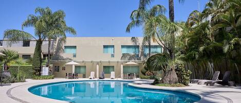 Outdoor pool, open 9 AM to 9 PM, sun loungers