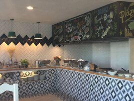 Breakfast, lunch, dinner served; international cuisine, garden views 