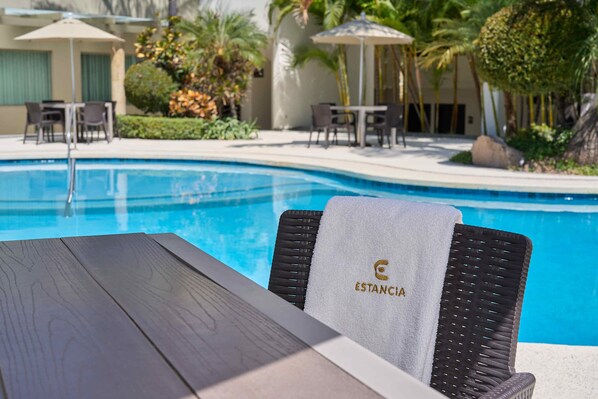 Outdoor pool, open 9 AM to 9 PM, sun loungers