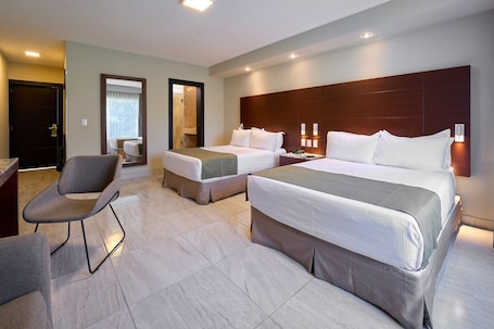 Executive Suite, Multiple Beds, Refrigerator | 1 bedroom, minibar, in-room safe, individually furnished