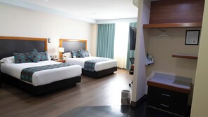 Habitació Deluxe | Roba de llit d'alta qualitat i caixa forta a l'habitació 