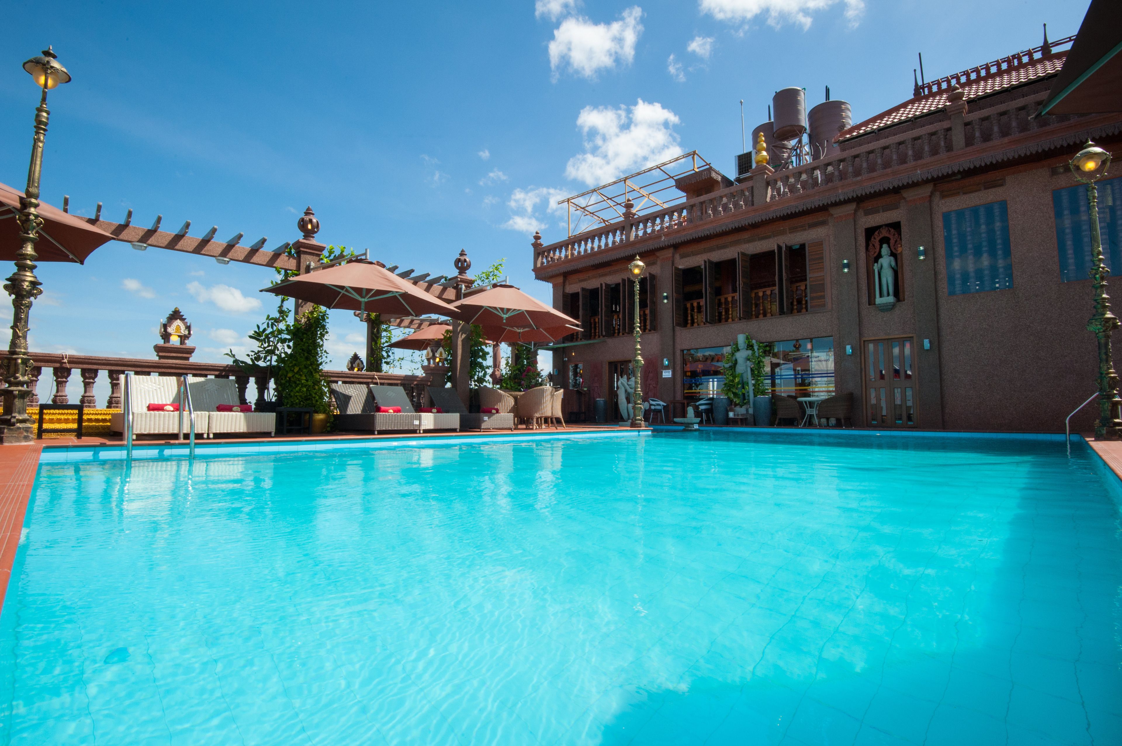 Outdoor pool, pool umbrellas, pool loungers