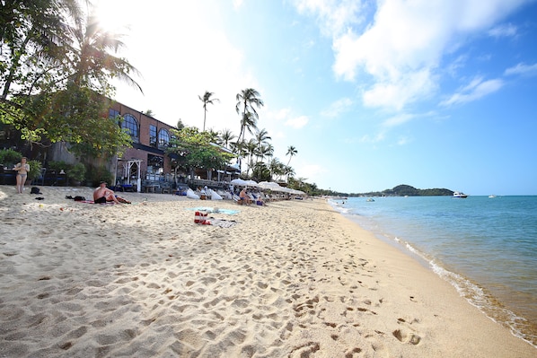 On the beach, beach towels