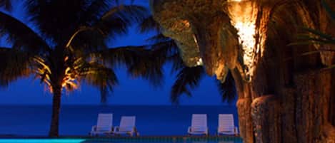 Outdoor pool, open 9:00 AM to 7:00 PM, pool umbrellas, pool loungers