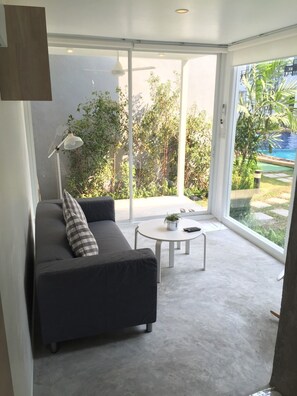 Family Loft, 3 Bedrooms, Hot Tub, Poolside | Living area | 32-inch LCD TV with cable channels, TV