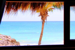 Family Quadruple Room, Multiple Beds, Partial Sea View | In-room safe, individually decorated, individually furnished