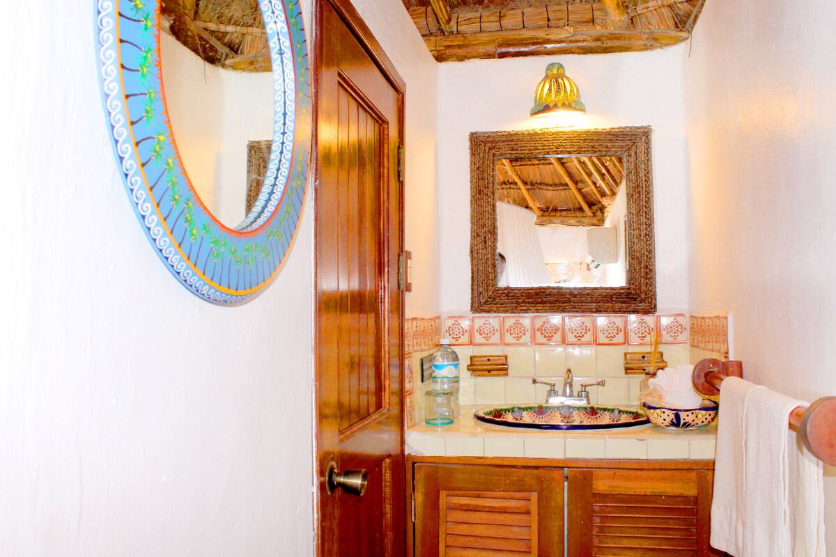 family quadruple room, multiple beds, partial sea view | bathroom | shower, rainfall showerhead, free toiletries, hair dryer