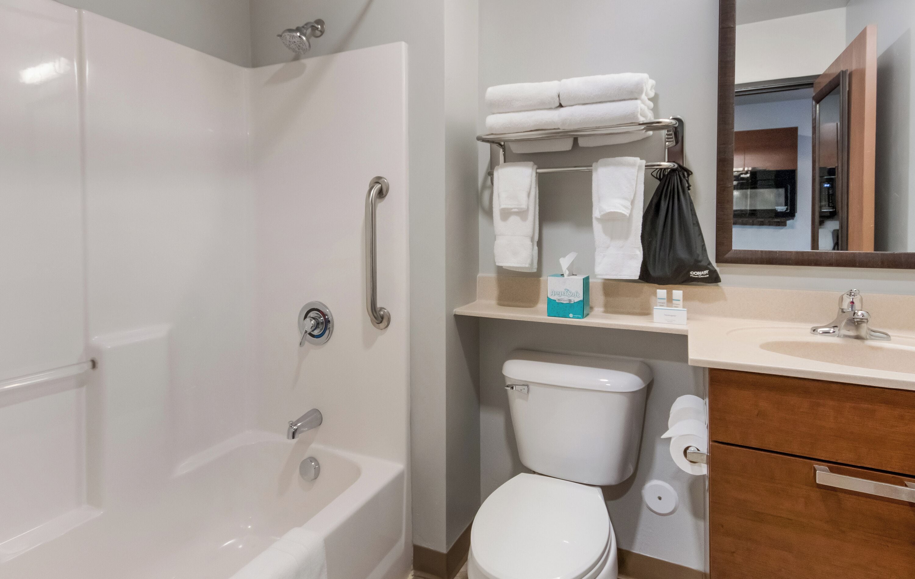 hair dryer, towels, soap, shampoo