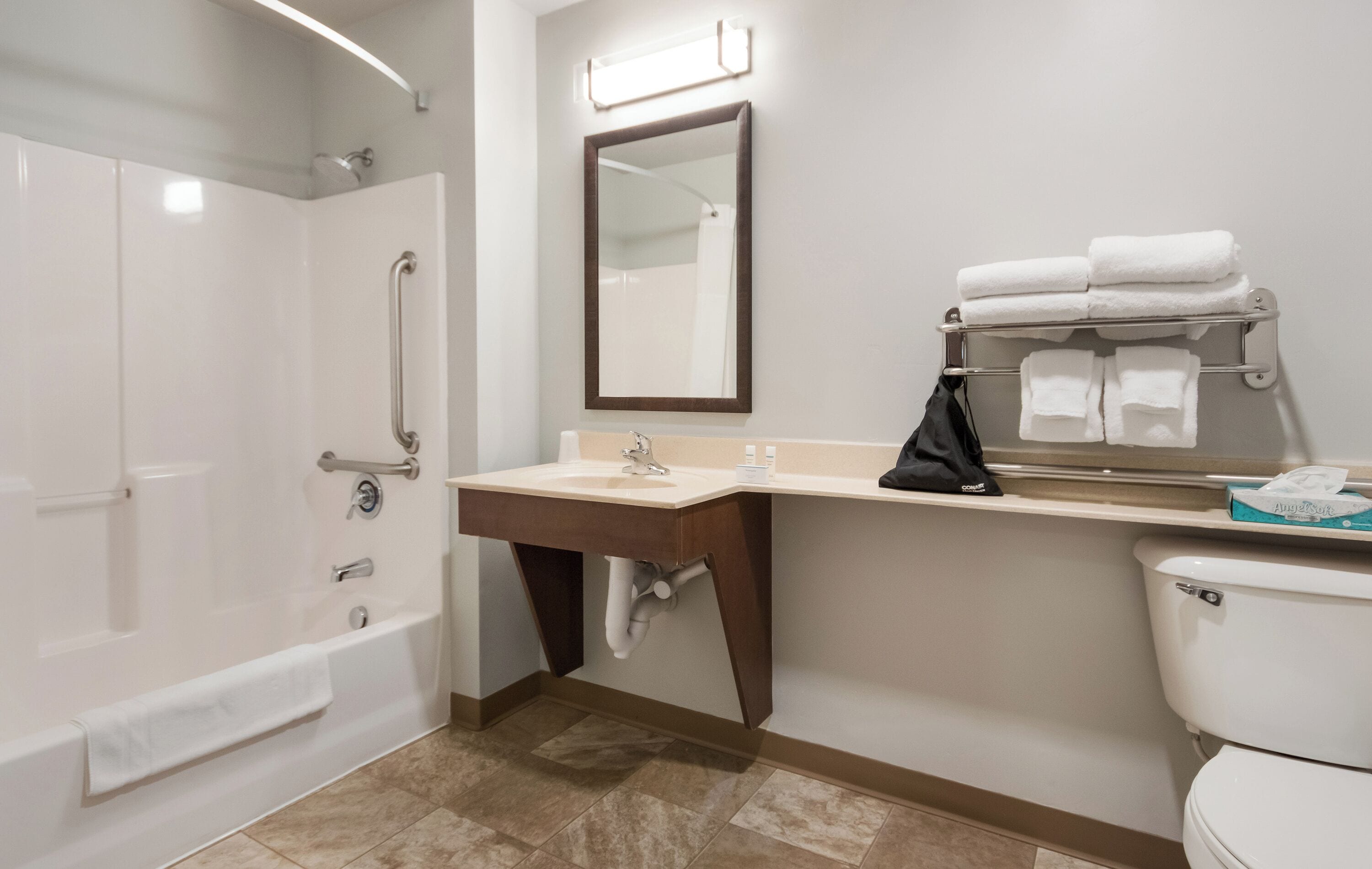 hair dryer, towels, soap, shampoo