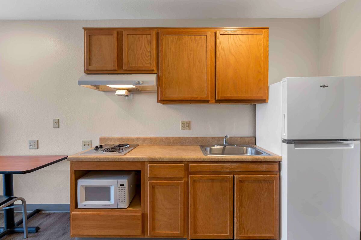 full-sized fridge, microwave, stovetop, freezer