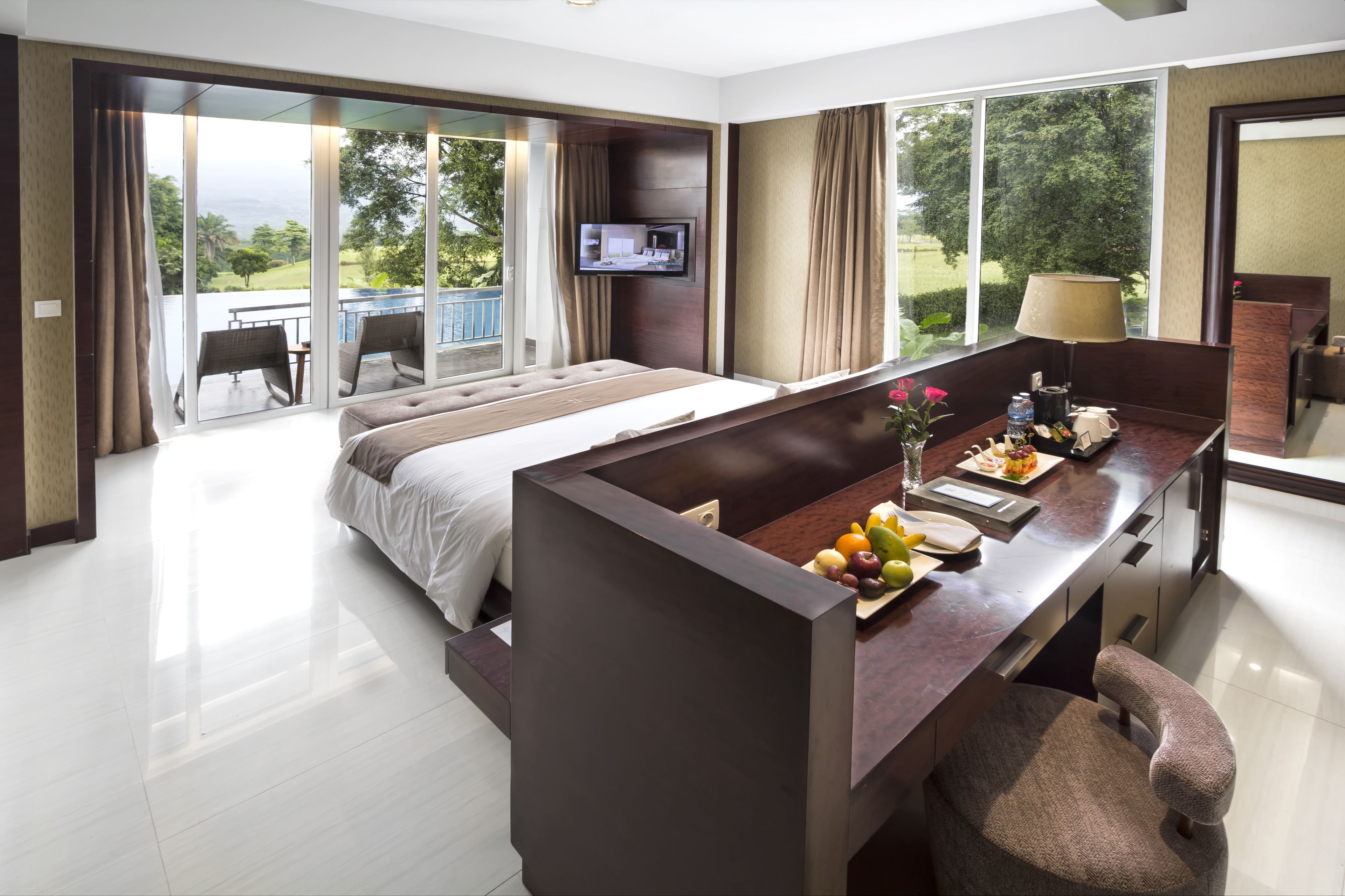 grand suite, lagoon view | in-room safe, desk, blackout curtains, iron/ironing board