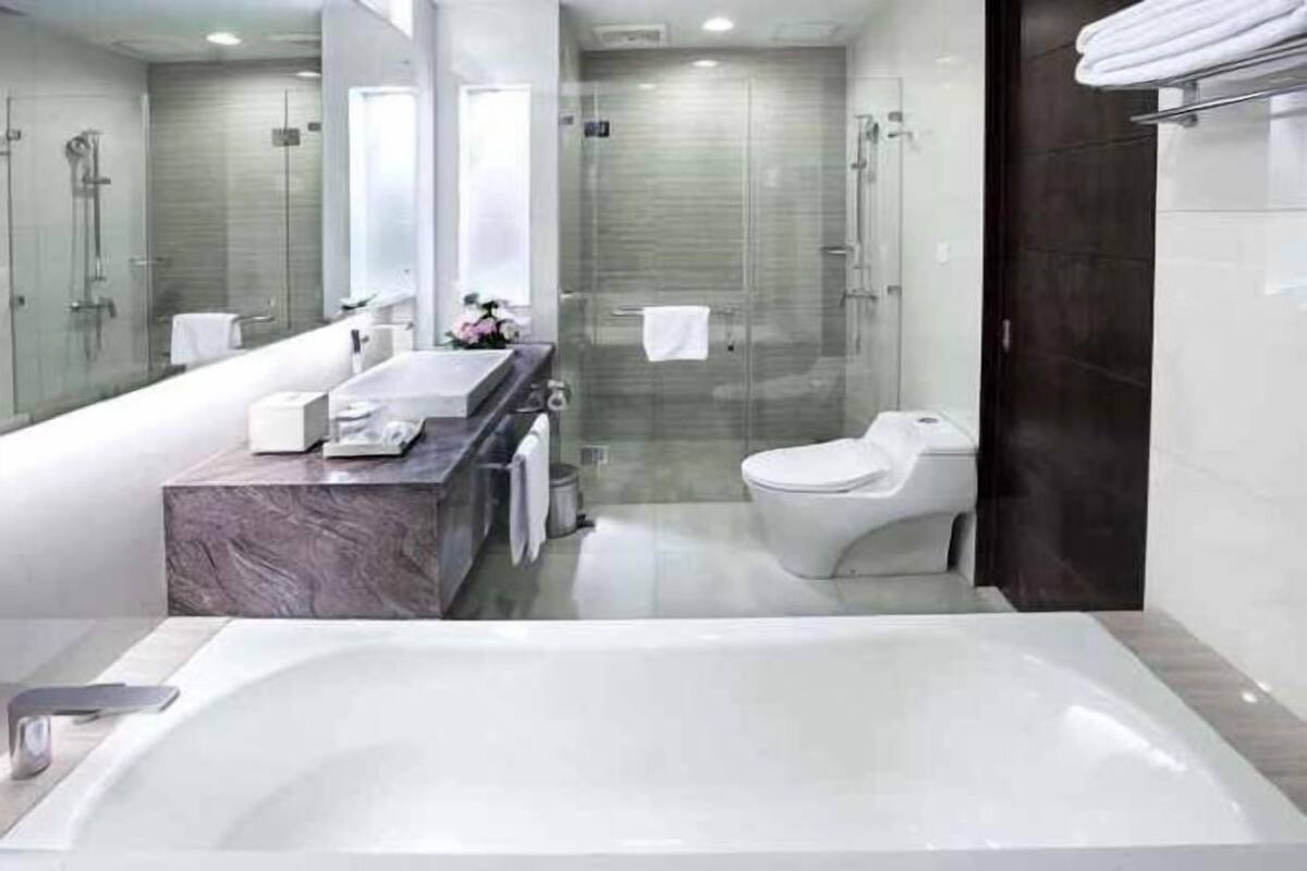 Bathroom | Hair dryer, slippers, towels