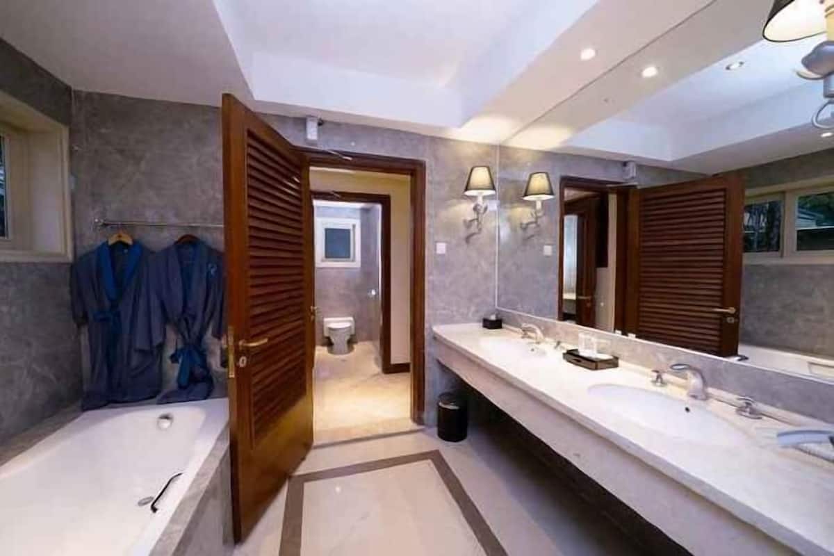 Bathroom | Hair dryer, slippers, towels