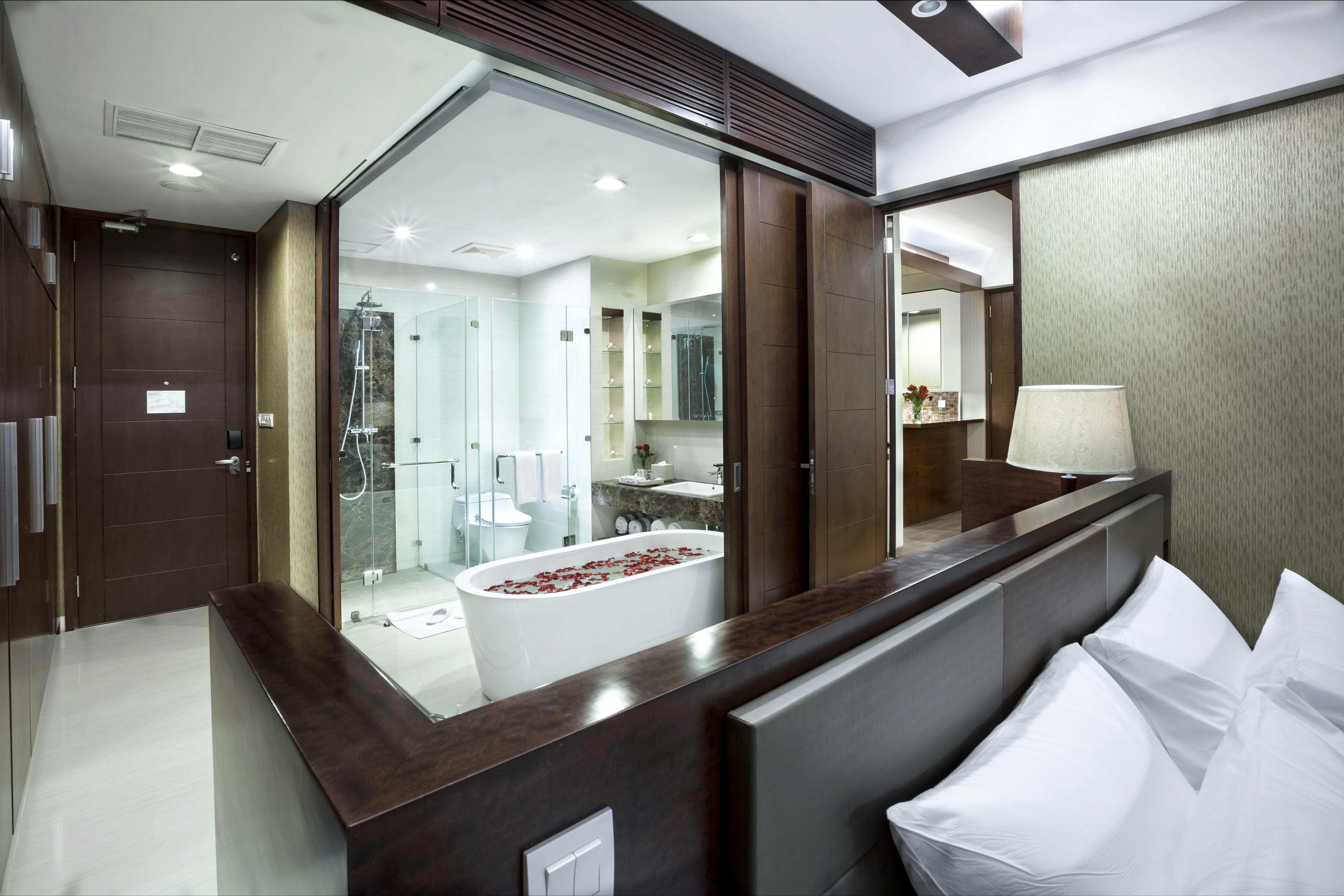 grand suite, lagoon view | in-room safe, desk, blackout curtains, iron/ironing board