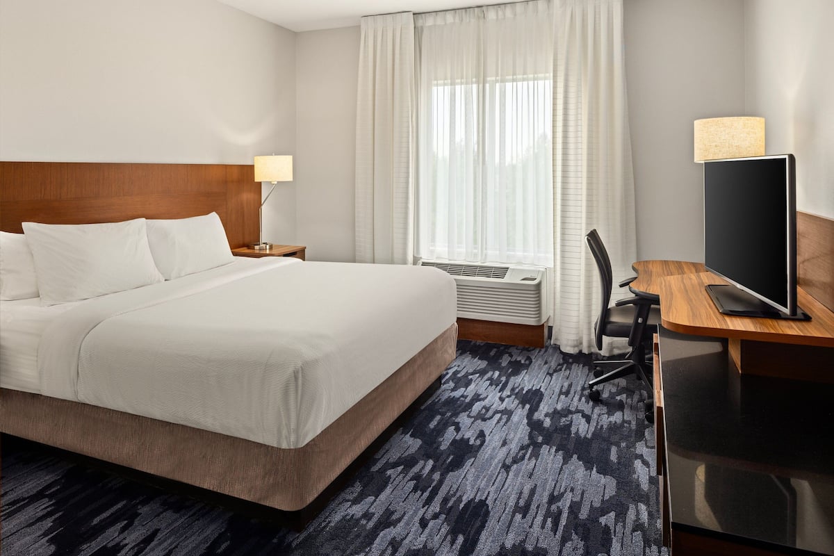 Down comforters, pillowtop beds, desk, blackout drapes