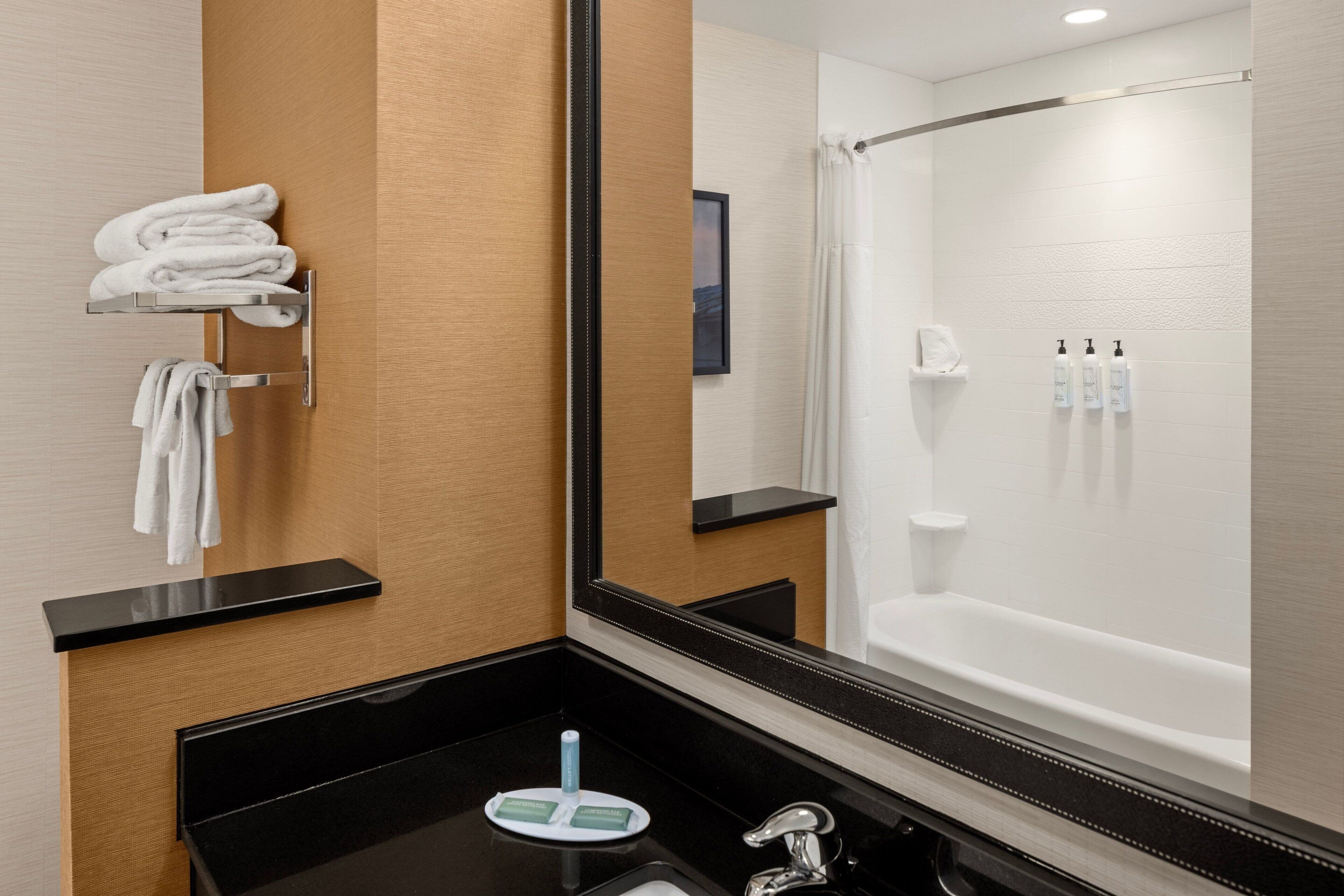 shower, free toiletries, hair dryer, towels