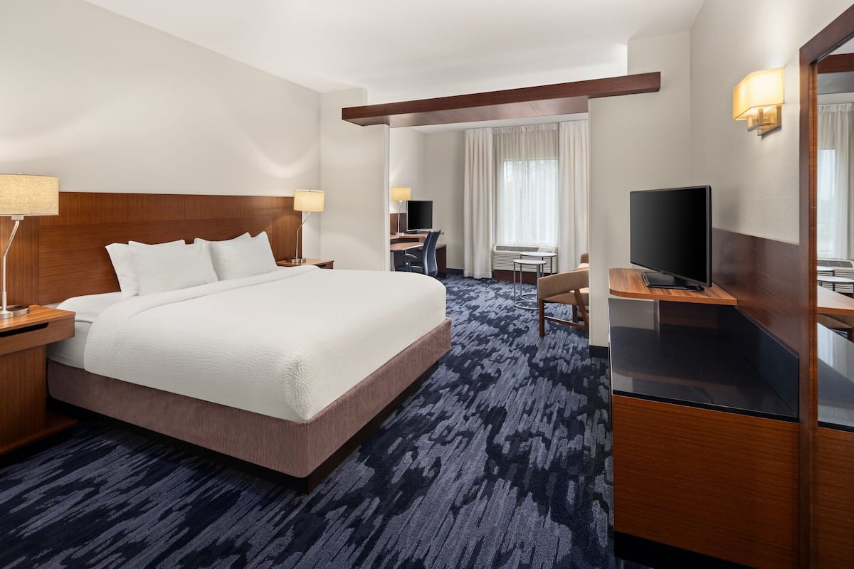 Down comforters, pillowtop beds, desk, blackout drapes