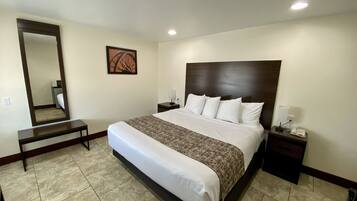 Habitación estándar, 1 cama King size | Camas con pillow-top, escritorio y espacio para trabajar con laptop